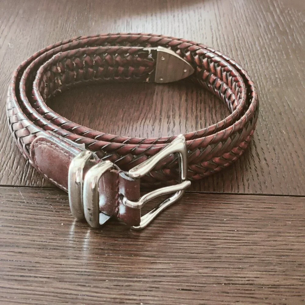 Leather Belt by Perry Ellis in a woven design with a belt buckle in Silver
